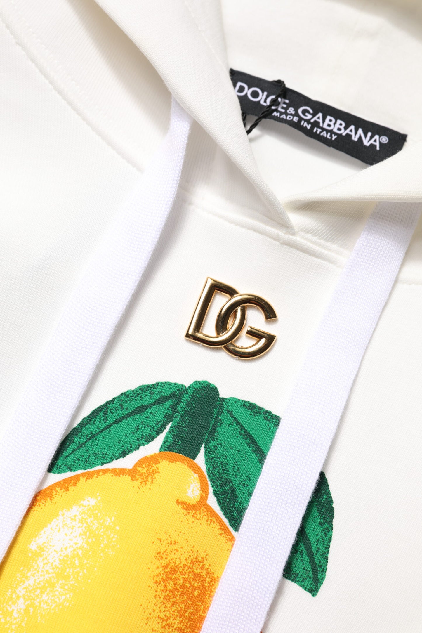 سترة دولتشي آند غابانا بغطاء رأس وطبعة قطنية عاجية اللون