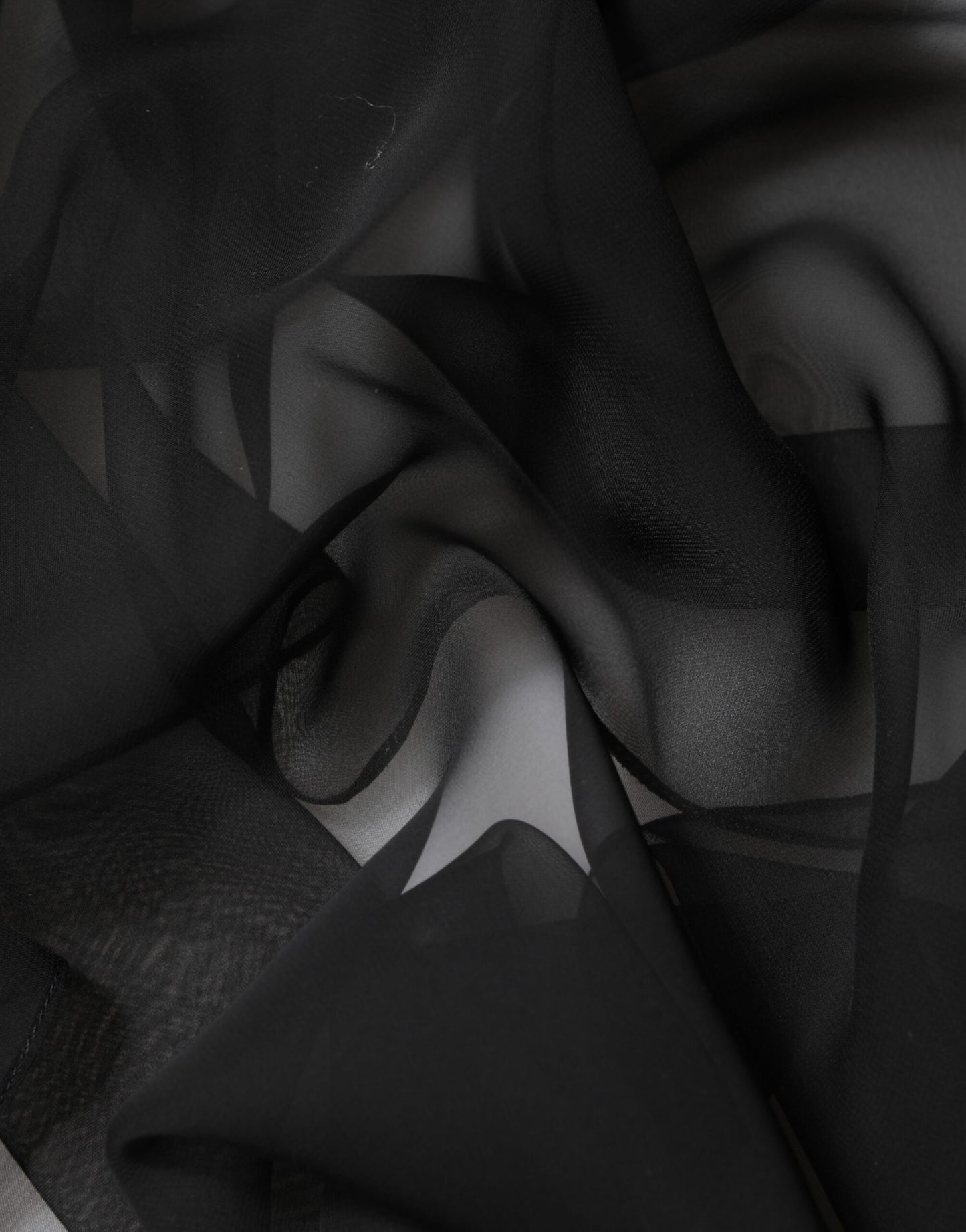 بلوزة دولتشي آند غابانا سوداء شفافة من الحرير والشيفون والدانتيل