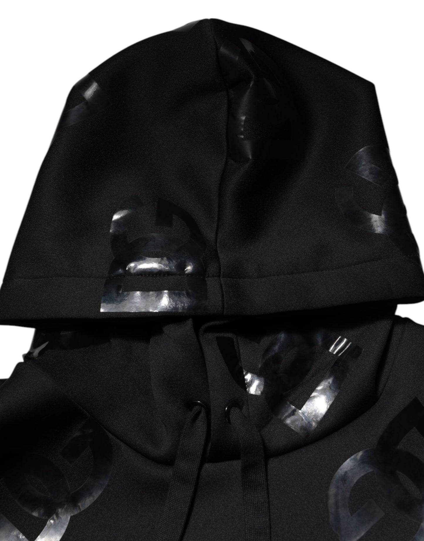 سترة دولتشي آند غابانا سوداء بغطاء رأس وطبعة معدنية وشعار DG