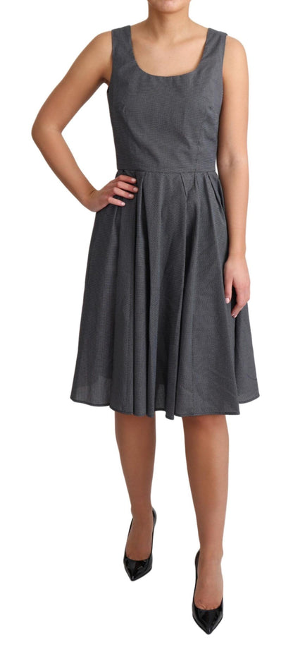 فستان دولتشي آند غابانا الأسود المنقط من القطن بقصة حرف A