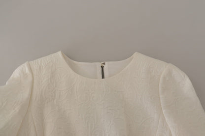 فستان دولتشي آند غابانا أبيض متوسط ​​الطول من قماش الجاكار المزهر