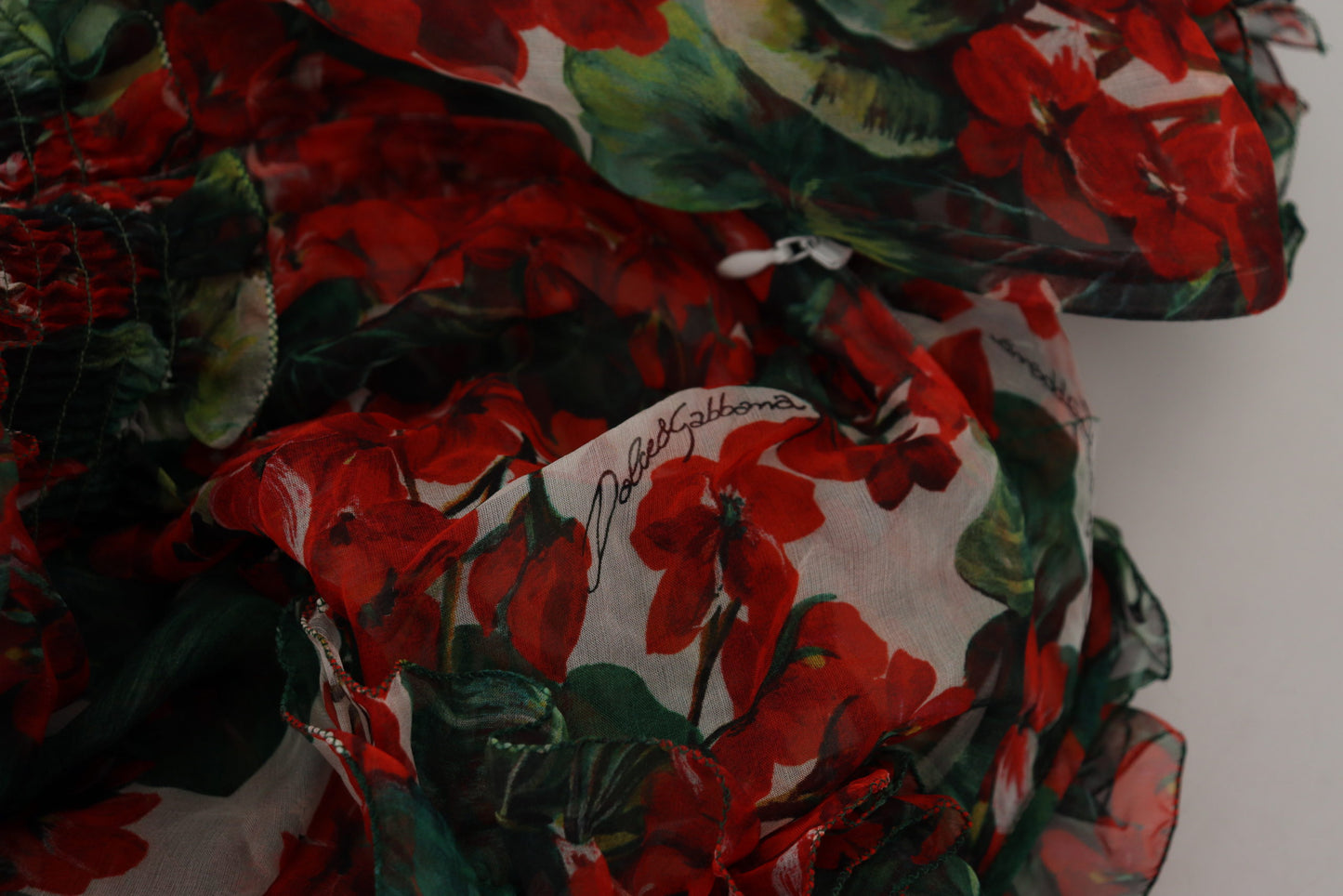 فستان دولتشي آند غابانا متعدد الألوان من نبات إبرة الراعي بطول الركبة