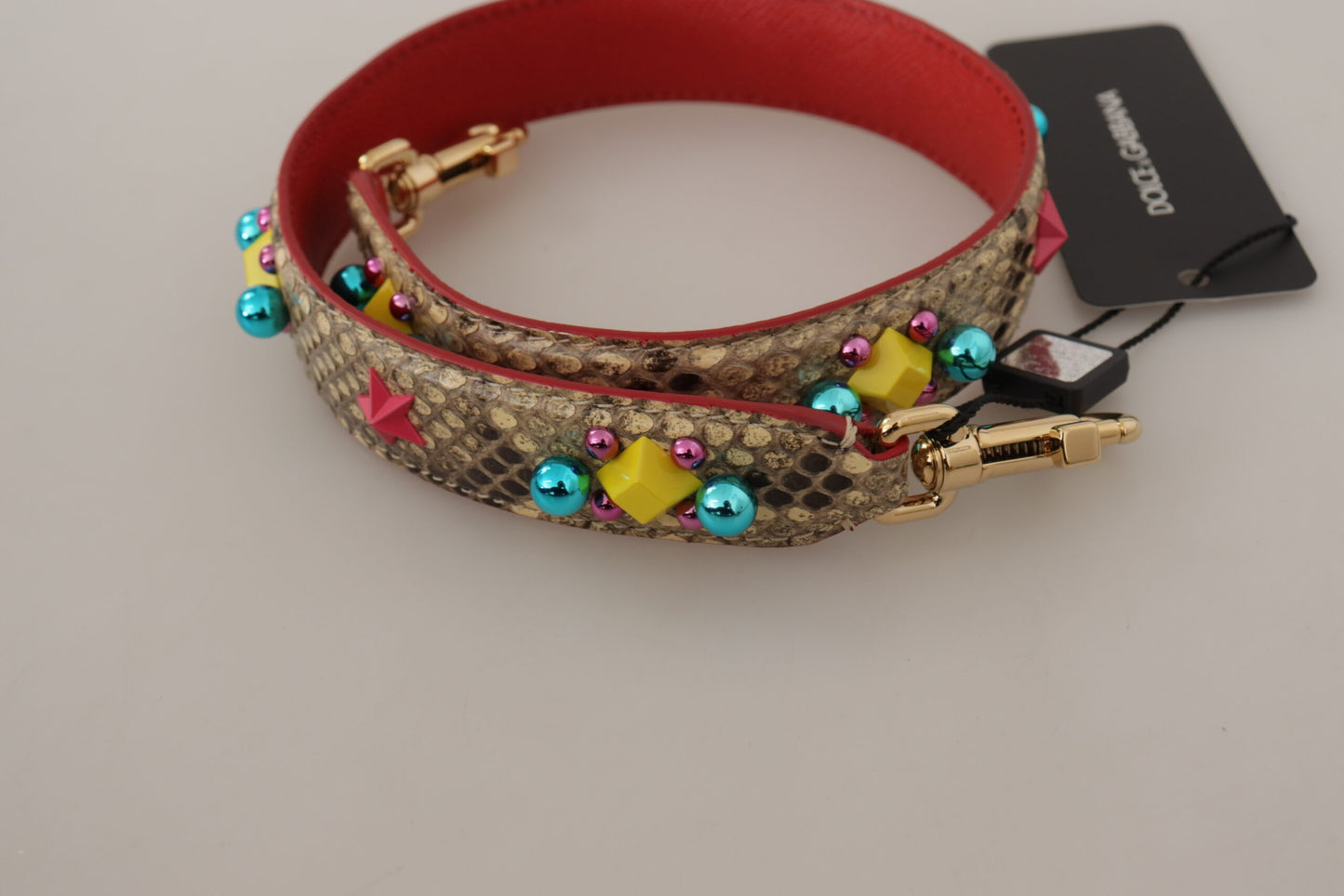 حقيبة دولتشي آند غابانا بحزام كتف من جلد الثعبان البيج مزينة بالكريستالات