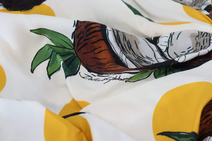 فستان دولتشي آند غابانا قصير من الحرير بطبعة جوز الهند باللون الأبيض