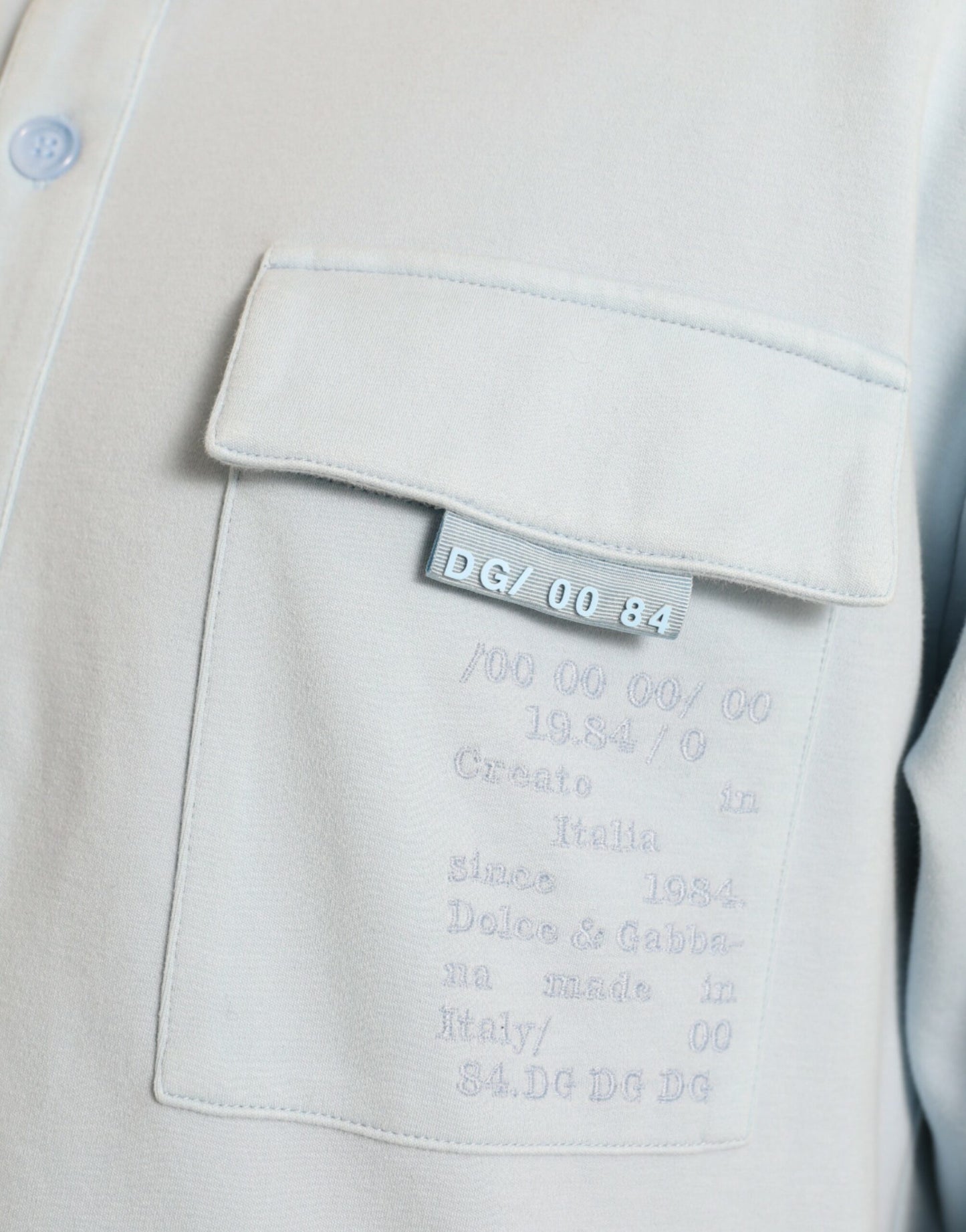 سترة دولتشي آند غابانا القطنية ذات الأزرار باللون الأزرق الفاتح