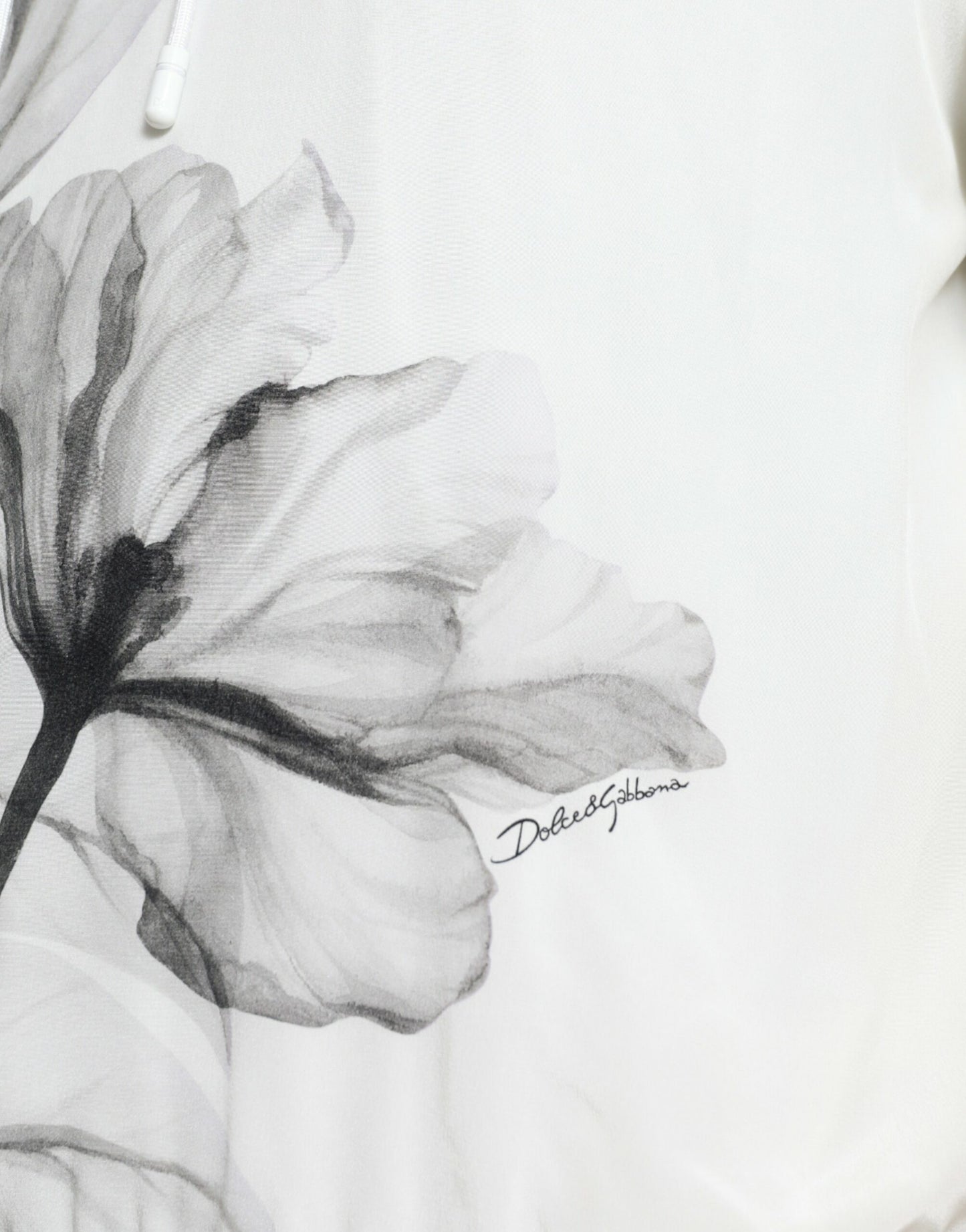 سترة دولتشي آند غابانا بغطاء رأس وطبعة زهور بيضاء