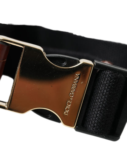 محفظة دولتشي آند غابانا إيربودز من جلد التمساح البني