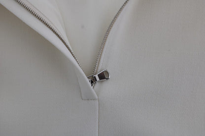 فستان دولتشي آند غابانا من الصوف الأبيض القابل للتمدد بروش