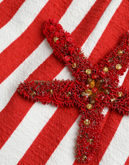 فستان دولتشي آند غابانا ميدي بدون أكمام مزين بالورود باللونين الأحمر والأبيض