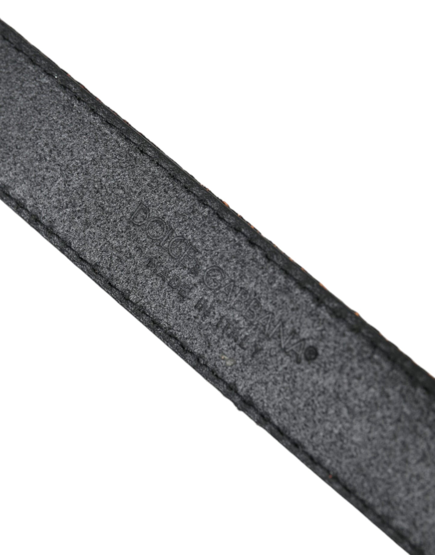 حزام دولتشي آند غابانا الذهبي المخطط بنقشة الجاكار مع مشبك معدني فضي