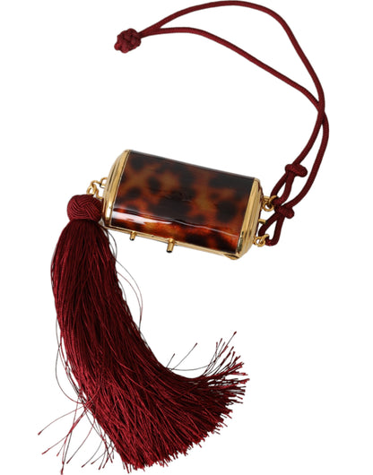 حقيبة دولتشي آند غابانا الصغيرة ذات المرآة البنية المزينة بنقشة جلد النمر مع شرابة لحمل المكياج