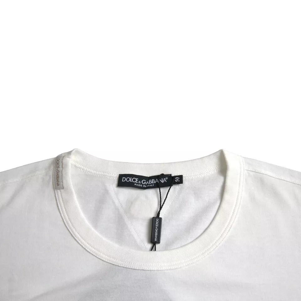 تي شيرت دولتشي آند غابانا أبيض من القطن بشعار مزهر ورقبة دائرية