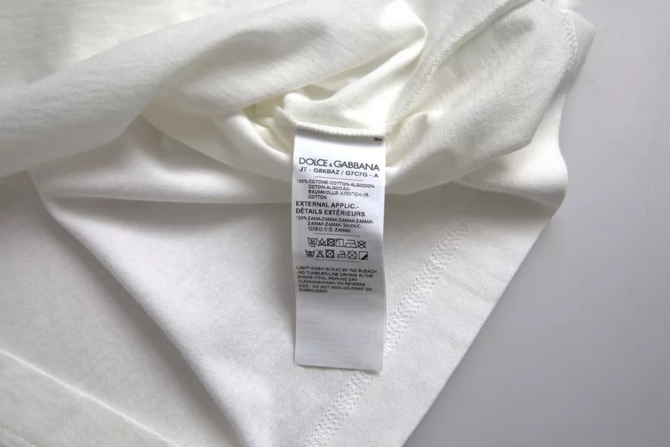 تي شيرت دولتشي آند غابانا أبيض من القطن بشعار مزهر ورقبة دائرية