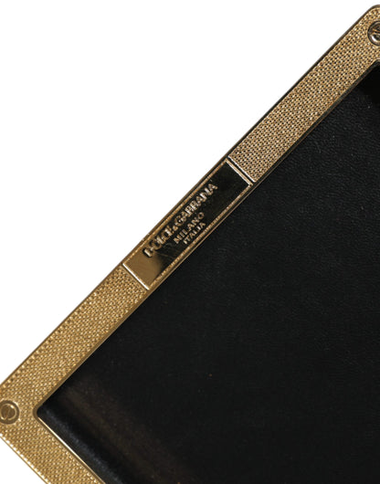 حقيبة يد دولتشي آند غابانا سوداء من الجلد بإطار ذهبي ومزينة بمسامير