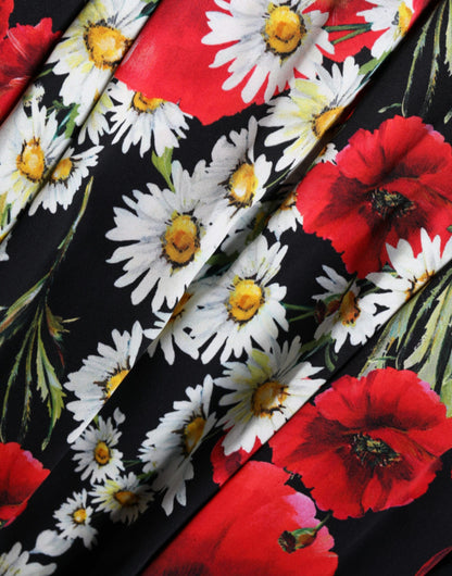 فستان دولتشي آند غابانا الأسود الحريري المزهر بدون أكمام طويل