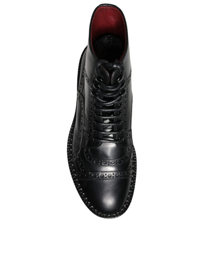 حذاء دولتشي آند غابانا أسود من الجلد برباط حتى منتصف الساق