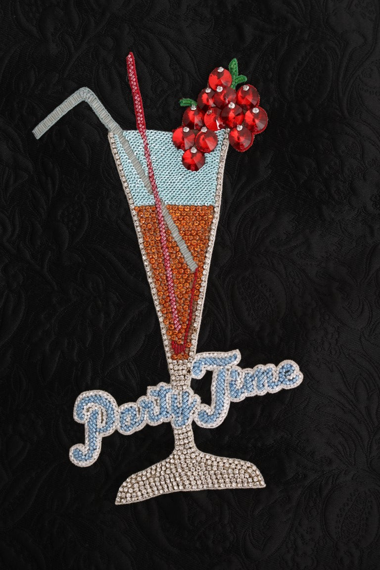 سترة دولتشي آند غابانا السوداء بقلنسوة من الكريستال بتصميم حكاية خرافية