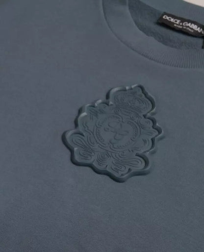 بلوفر رجالي من دولتشي آند غابانا، أزرق من القطن، برقبة دائرية، وشعار مطبوع