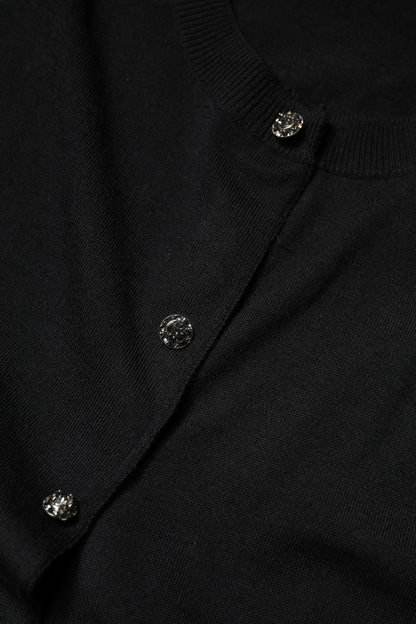 بلوزة دولتشي آند غابانا سوداء بأكمام قصيرة وأزرار