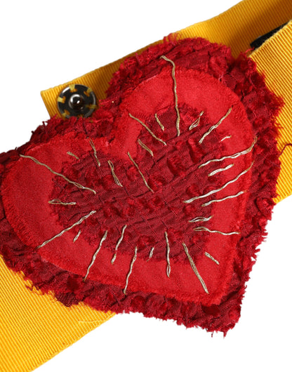 حزام دولتشي آند غابانا الأصفر المرن ذو الخصر العريض والمزين بقلب