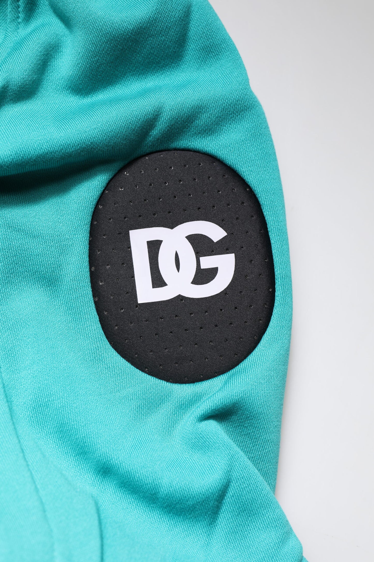 سترة رياضية رجالية بغطاء رأس من القطن الأخضر من دولتشي آند غابانا