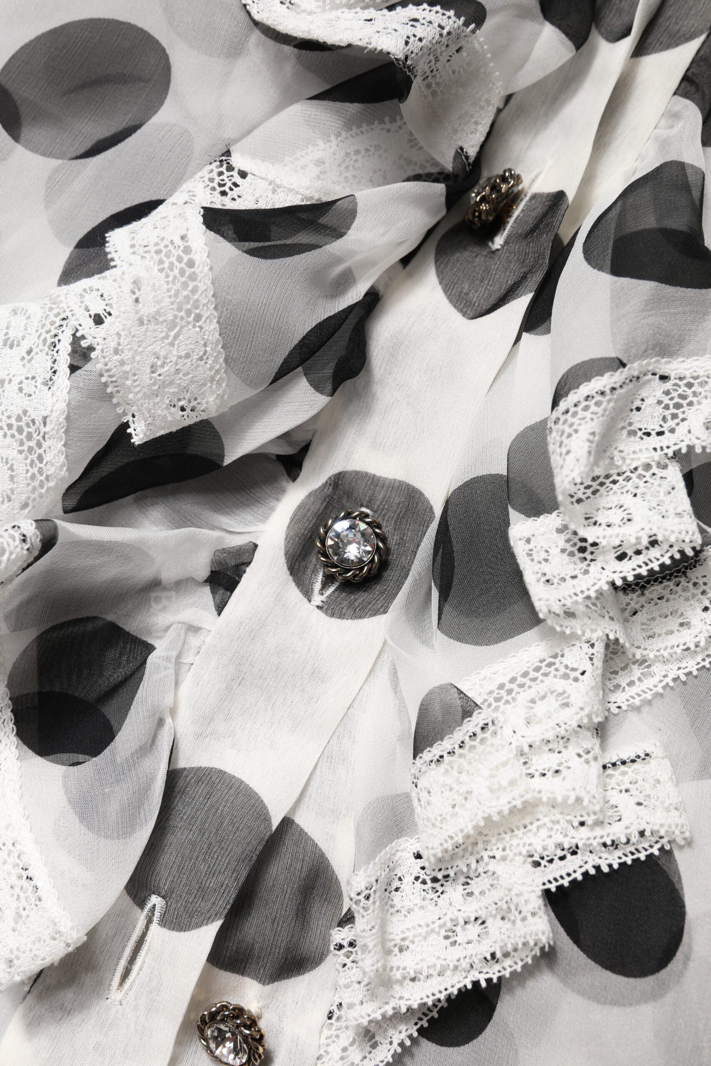 بلوزة دولتشي آند غابانا بدون أكمام من القطن باللونين الأبيض والأسود