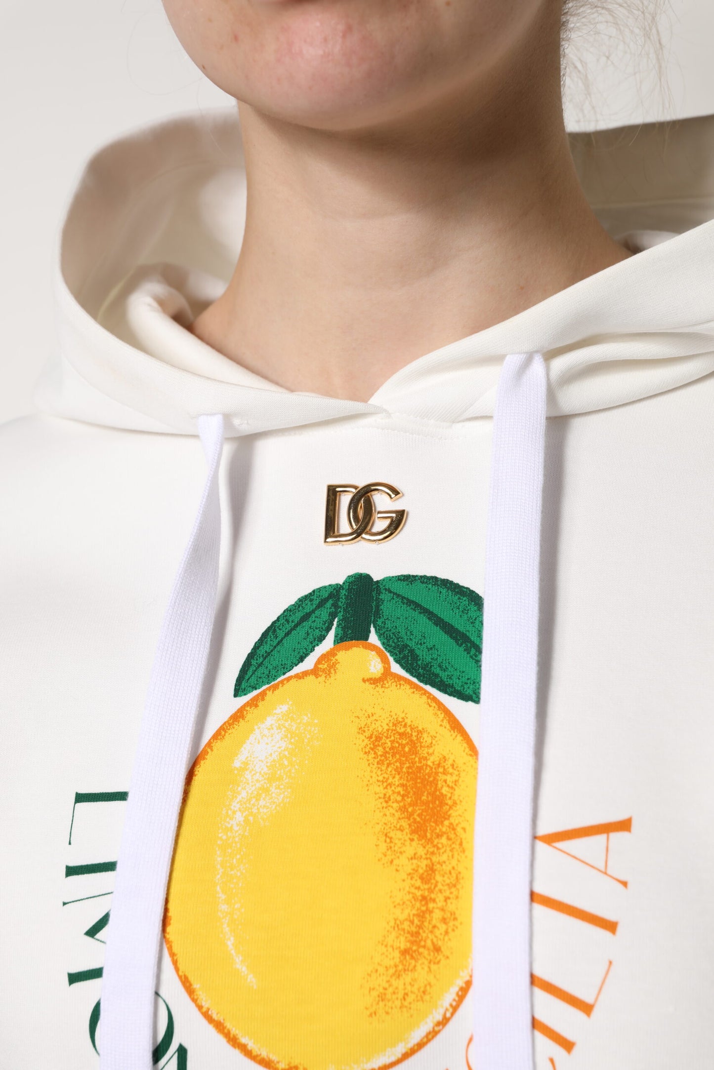 سترة دولتشي آند غابانا بغطاء رأس وطبعة قطنية عاجية اللون