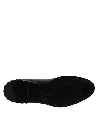 حذاء دولتشي آند غابانا أسود من الجلد بشعار ومرصع بالمسامير