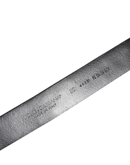 حزام دولتشي آند غابانا من الجلد الأسود المرصع بالمسامير ومشبك معدني بشعار