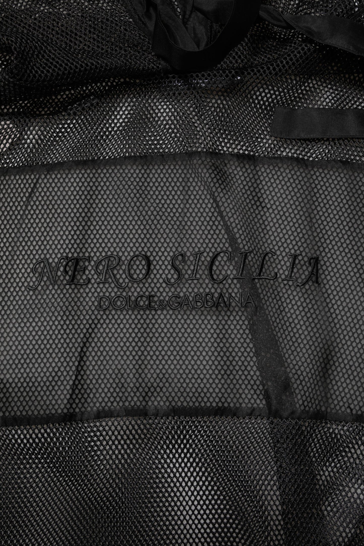 سترة دولتشي آند غابانا سوداء شفافة بغطاء رأس