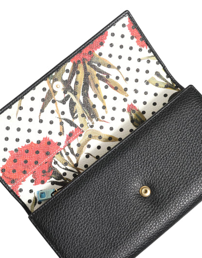 محفظة دولتشي آند غابانا ثلاثية الطي من الجلد الأسود مع لوحة شعار