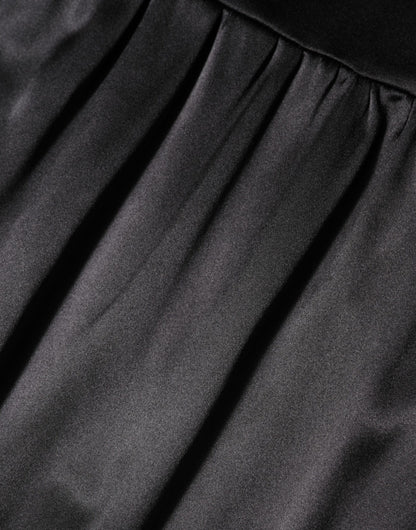 فستان دولتشي آند غابانا قصير بدون أكمام بدانتيل وحواف من الحرير الأسود