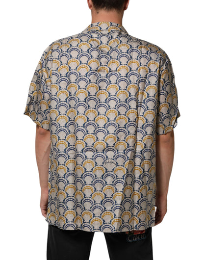 قميص دولتشي آند غابانا كريمي من القطن والحرير بطبعة صدفة هاواي