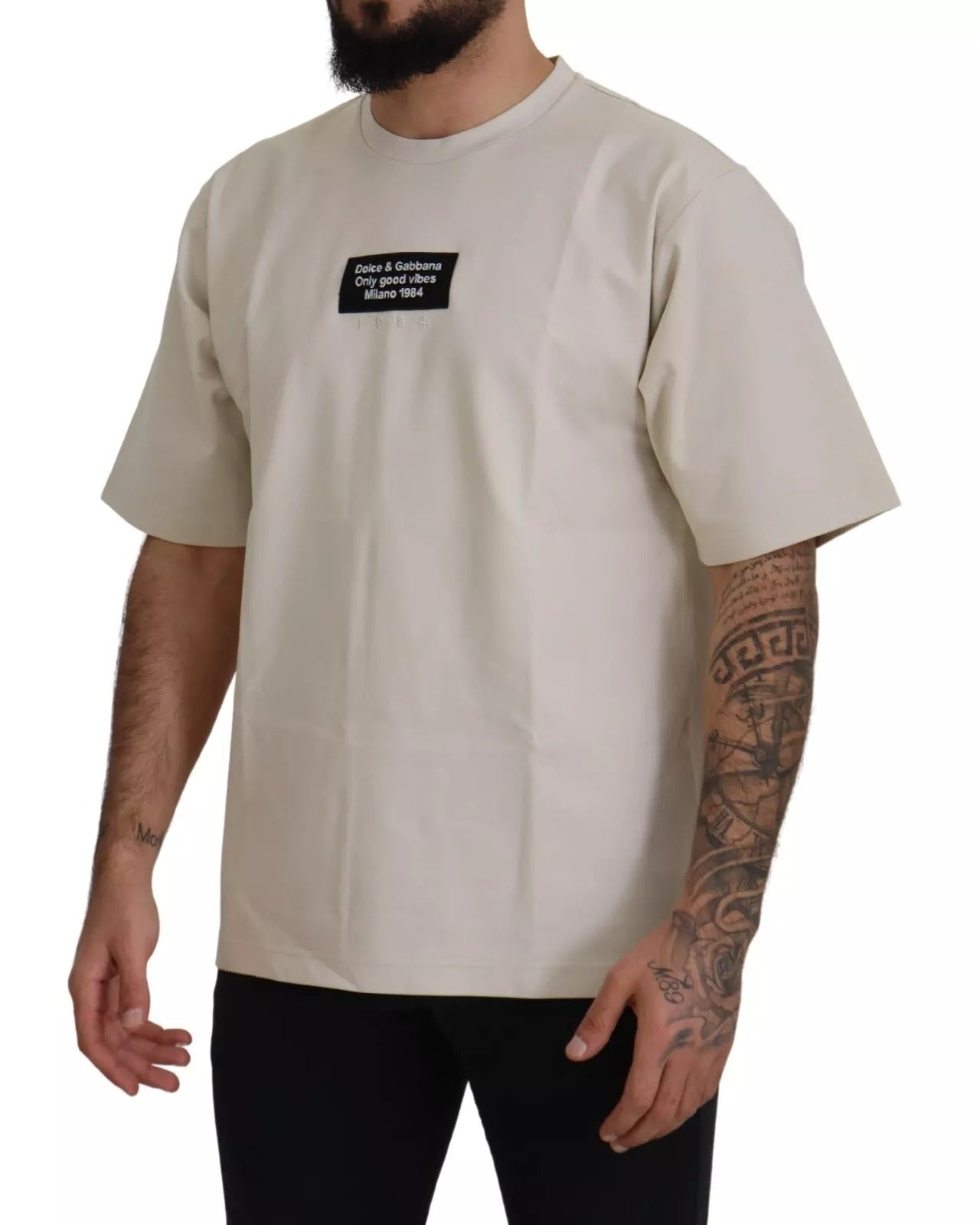 قميص دولتشي آند غابانا عاجي قطني مطبوع برقبة دائرية