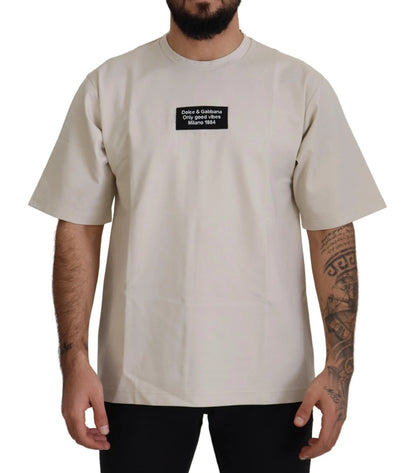 قميص دولتشي آند غابانا عاجي قطني مطبوع برقبة دائرية