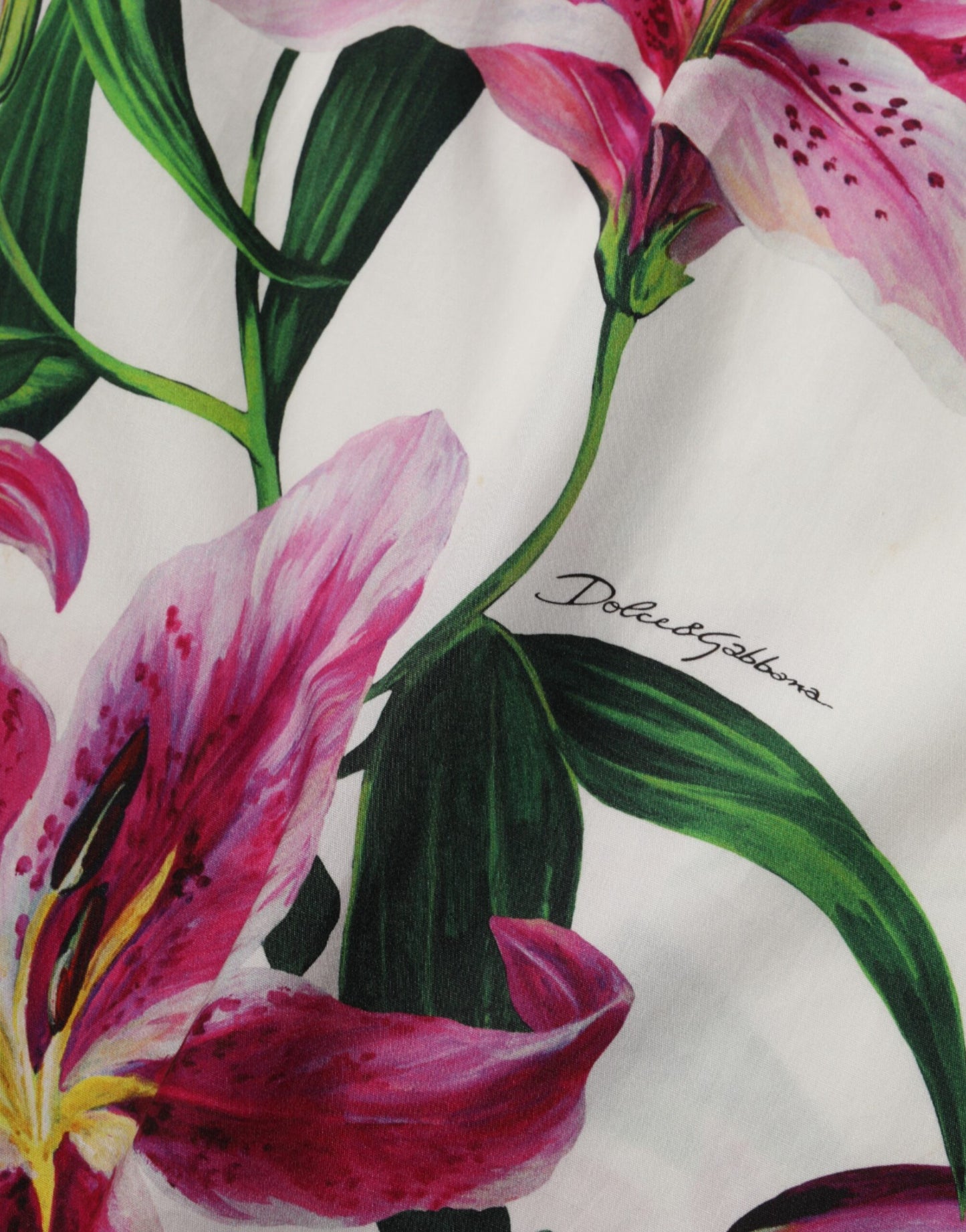 فستان دولتشي آند غابانا الأبيض القطني المزهر بدون أكمام