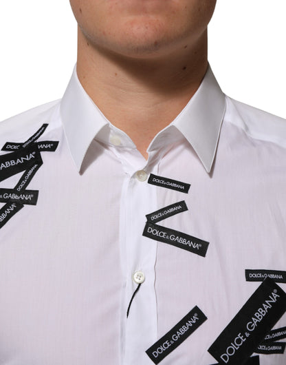 قميص دولتشي آند غابانا أبيض من القطن بشعار ذهبي وياقة